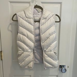 White puffy hooded vest